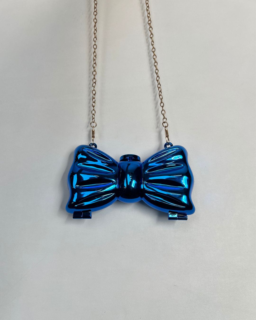 Metallic Bow-Shaped Mini Clutch Bag with Chain Strap