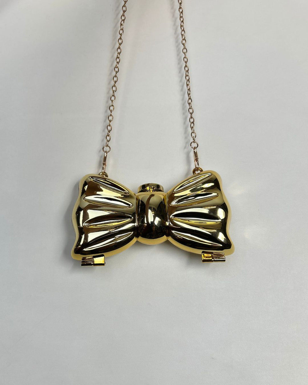 Metallic Bow-Shaped Mini Clutch Bag with Chain Strap