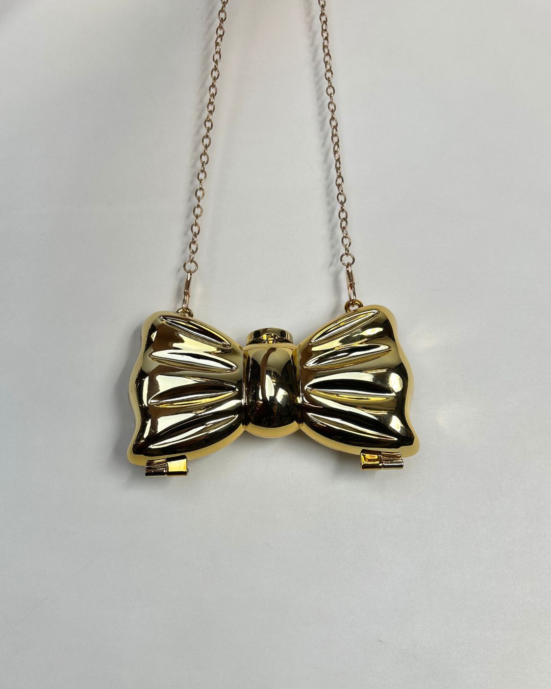 Metallic Bow-Shaped Mini Clutch Bag with Chain Strap