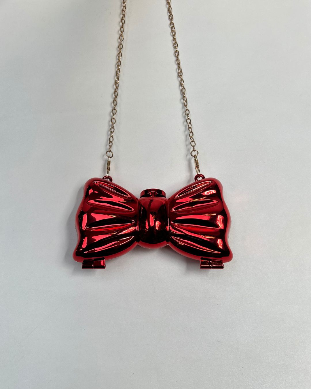Metallic Bow-Shaped Mini Clutch Bag with Chain Strap