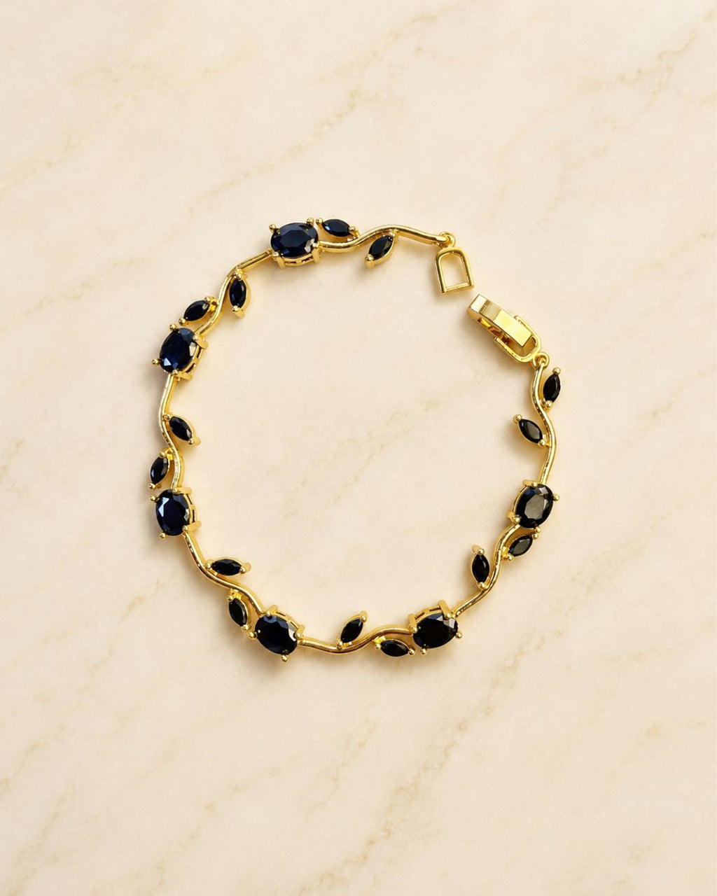 Gold Tone Tulip Crystal Bracelet with Floral Vine Design