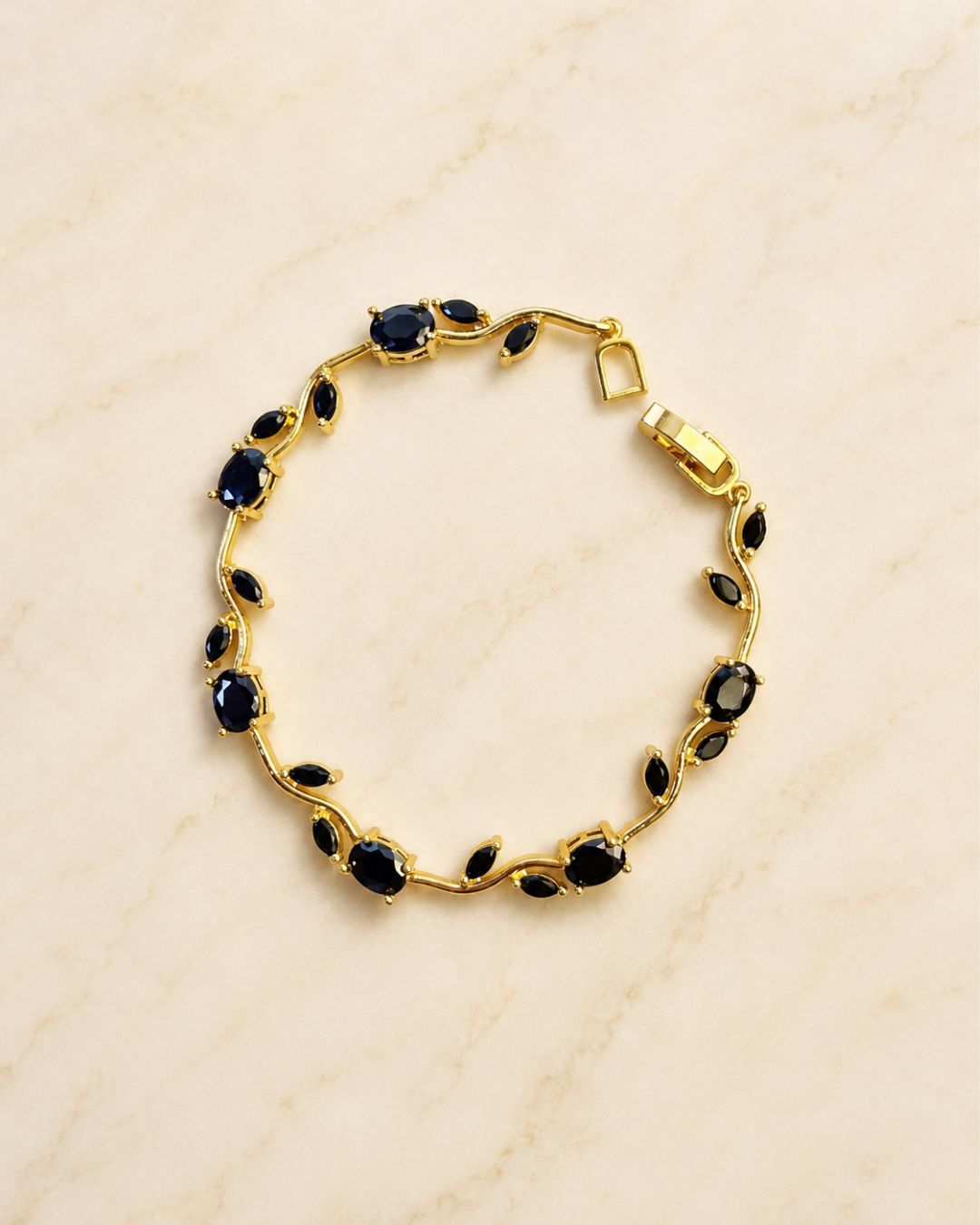 Gold Tone Tulip Crystal Bracelet with Floral Vine Design