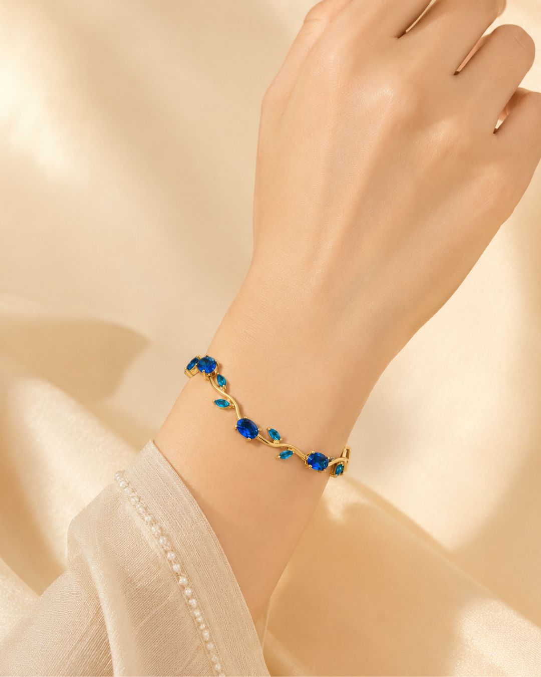 Gold Tone Tulip Crystal Bracelet with Floral Vine Design
