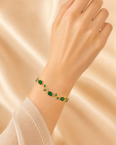 Gold Tone Tulip Crystal Bracelet with Floral Vine Design