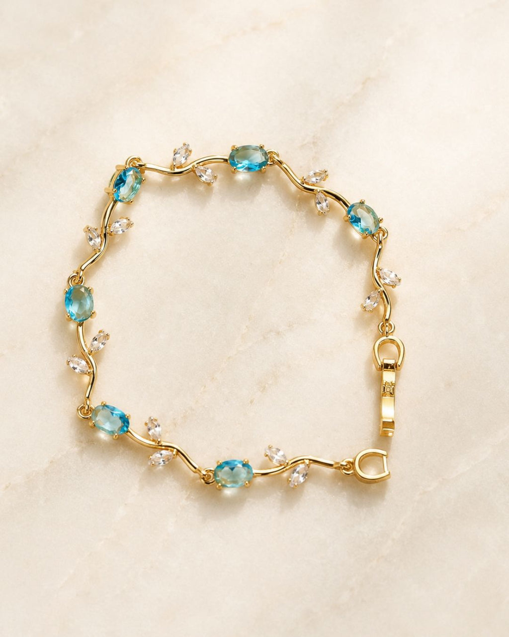 Gold Tone Tulip Crystal Bracelet with Floral Vine Design