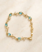Gold Tone Tulip Crystal Bracelet with Floral Vine Design