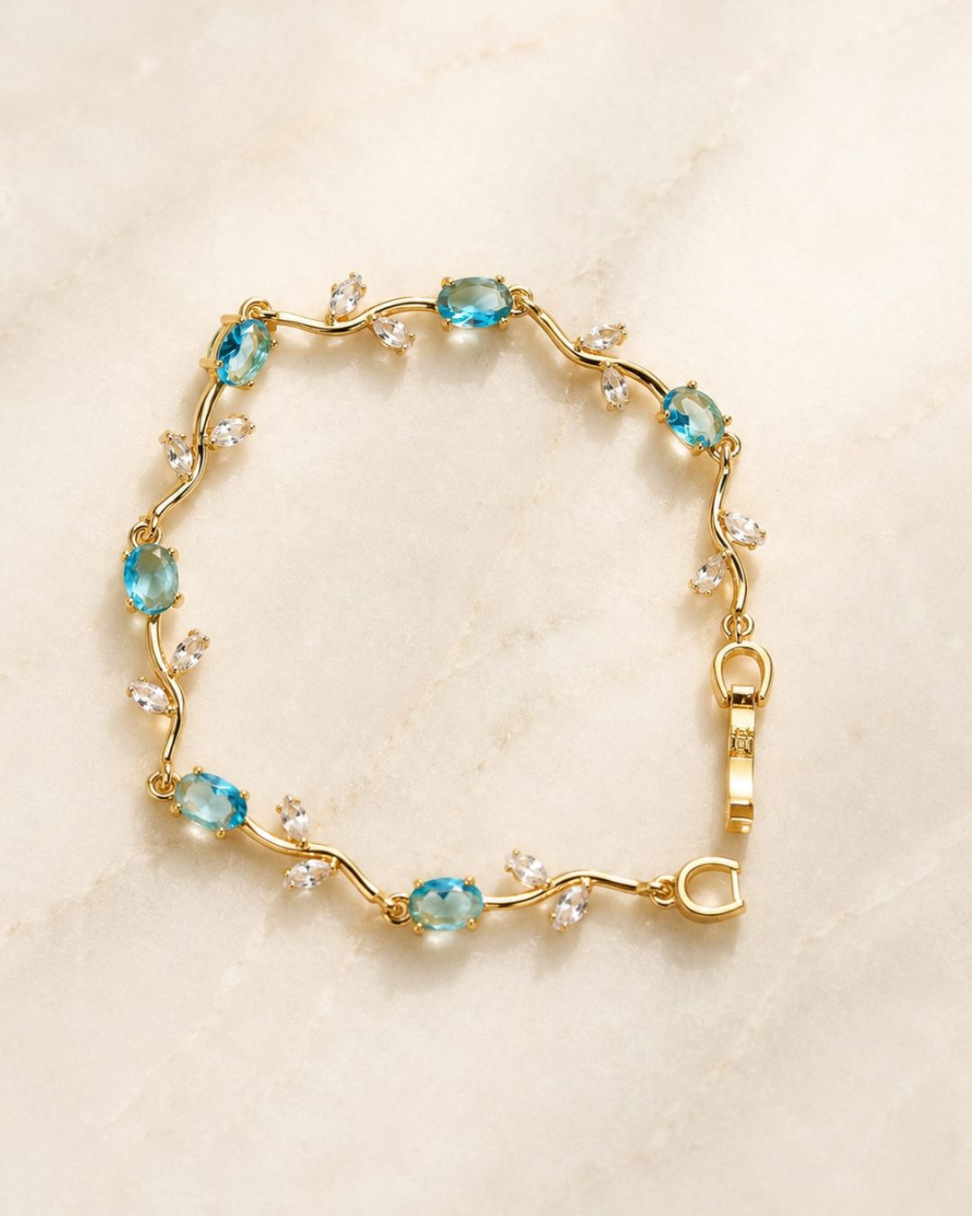 Gold Tone Tulip Crystal Bracelet with Floral Vine Design