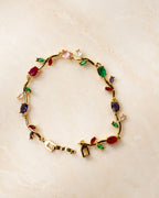Gold Tone Tulip Crystal Bracelet with Floral Vine Design