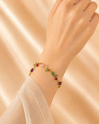 Gold Tone Tulip Crystal Bracelet with Floral Vine Design