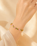 Gold Tone Tulip Crystal Bracelet with Floral Vine Design