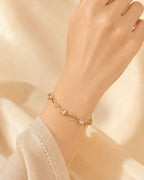 Gold Tone Tulip Crystal Bracelet with Floral Vine Design