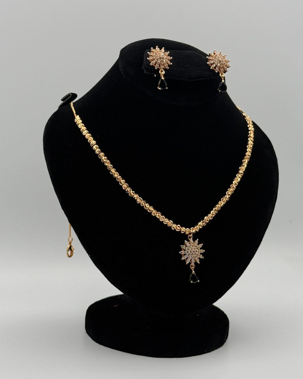 Gold Starburst Pendant Locket Set with Earrings – White Crystal