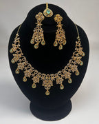 Gold Zircon Party Wear Jewelry Set with Earrings & Tikka