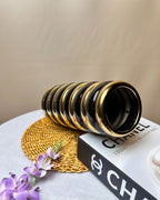 Gloss Finish Ribbed Ceramic Vase with Metallic Accents